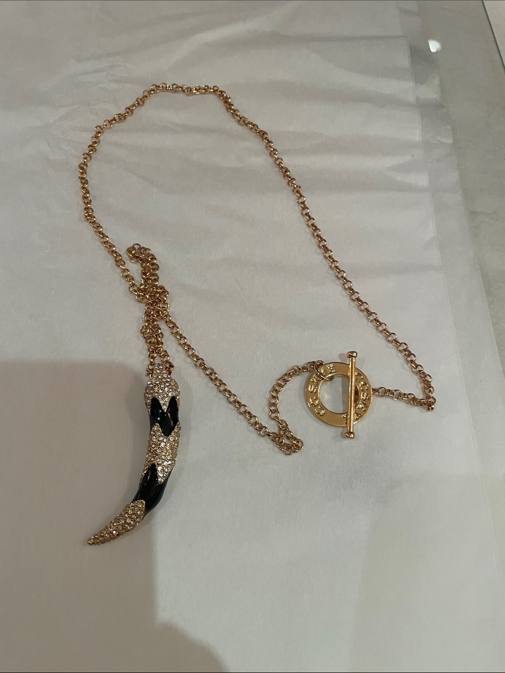 CC Skye Gold-Tone Horn Pendant Necklace with Black Enamel & Crystal